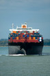 fully loaded container ship head-on
