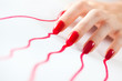 Photo: Young woman hand with red traces Young woman hand with red traces