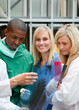 Foto: Group of doctors looking at a x-ray Group of doctors looking at a x-ray