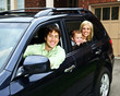 Happy family in car
