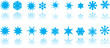 blue snowflakes on white background with reflection