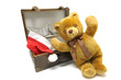 Old case with chrismas hat and teddybear