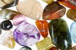 collection of beautiful precious stones against white background
