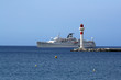 Cruise ship and lighthouse