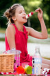 Eating a strawberry Eating a strawberry