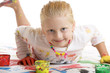 child smiles happy while painting - Kind lacht beim Malen