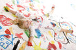 smiling child full of paint -  bemaltes Kind lacht