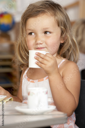 Photo: Young Boy Having Tea at Montessori/Pre-School Young Boy Having Tea at Montessori/Pre-School