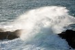 wave splashing on rock