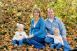 Happy Family Sitting in the Yard Happy Family Sitting in the Yard