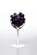 wineglass full of grapes