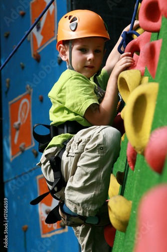 Photo: Boy on climbing wall Boy on climbing wall