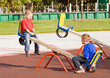 Children on a seesaw
