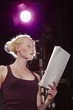 Young woman on stage, close up