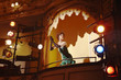 Young woman in theatre box