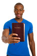 Student holding a bible showing commitment Student holding a bible showing commitment