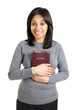 Young woman holding a bible showing commitment Young woman holding a bible showing commitment