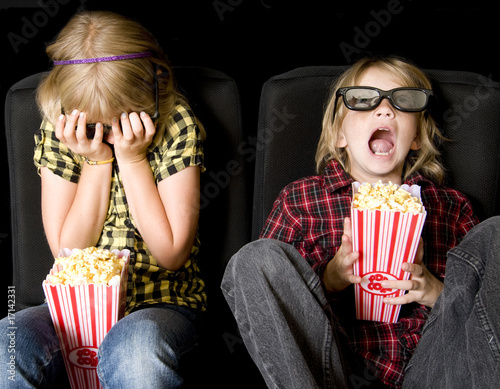 Photo: Two Kids at a Scary 3-D Movie Two Kids at a Scary 3-D Movie