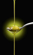 olive Oil in the spoon olive Oil in the spoon