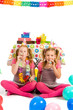 Girls with party blowers Girls with party blowers