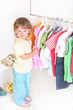 child in the clothes shop