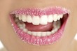 Lips of a woman in sugar pink macro Lips of a woman in sugar pink macro
