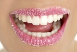 Lips of a woman in sugar pink macro