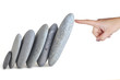 woman finger hold stones