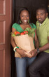 Black couple coming with groceries shopping