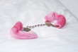 Fluffy pink hand cuffs