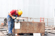 welder with protective mask welding metal and sparks