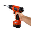 Hand holding cordless drill