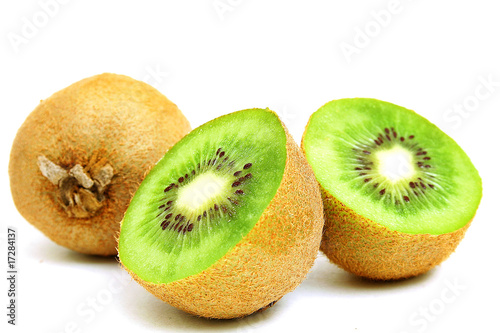 Photo: cut kiwi on white cut kiwi on white