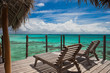 Relaxing on an over water tropical bungalow