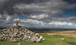 Rocky cairn on Dartmoor with cloudy sky