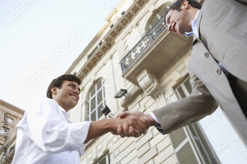 Foto: Two Businessmen Shaking Hands Two Businessmen Shaking Hands