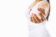 Woman giving her hand to give support for AIDS cause or breast c