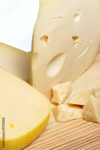 Photo: Cheese Different Sorts a on white background Cheese Different Sorts a on white background