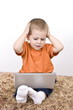 Foto: boy working whit laptop boy working whit laptop