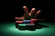 A hand about to rake a big pile of chips. A hand about to rake a big pile of chips.
