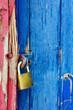 Photo: Padlock on highly textured door Padlock on highly textured door
