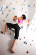 Woman at the climbing wall