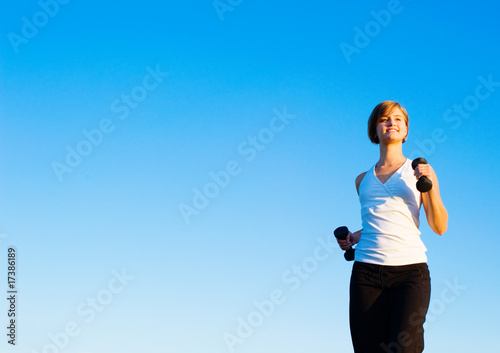Photo: Young Woman Walking Young Woman Walking