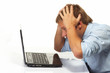 A stressed businessman with laptop A stressed businessman with laptop