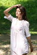 Attractive girl bathing in park