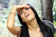 Closeup portrait of a woman on urban background