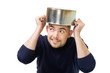 Man afraid and protecting with casserole