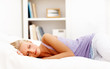 Cute young female sleeping in bed Cute young female sleeping in bed