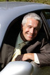 Mature businessman in a car Mature businessman in a car