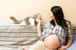 Photo: Pregnant woman with cat Pregnant woman with cat